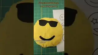 Smiley face emoji pillow