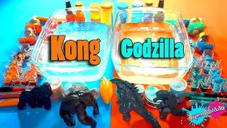 Mezclando Godzilla VS Kong en Slime (Naranja VS Turquesa) - Supermanualidades