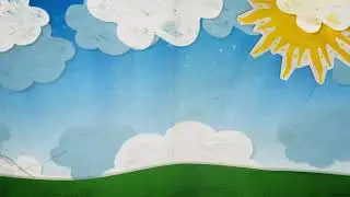 Animated Paper Sun, Clouds, Blue Sky Above Green Grass Christian Background Worship Motion Wallpaper