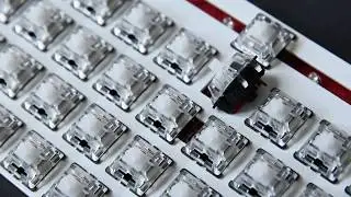 Desoldering a Mechanical Keyboard Switch using a Cheap Solder Sucker