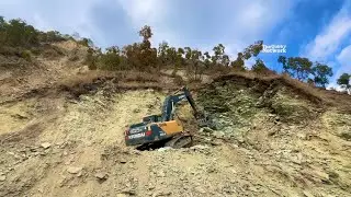 Mountain Road Construction: Mud and Stone Removal Using Hyundai Excavator