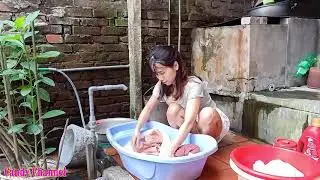 Beautiful single mother cleaning and washing clother at the beginning of the week