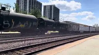 Union Pacific Mixed Freight Train Moving Slowly Through Wheaton