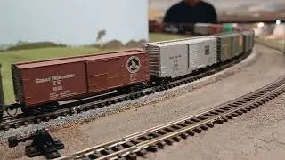 2 n scale Intermountain ac12s hauling a 1950s era freight(the model railroad club of union nj)