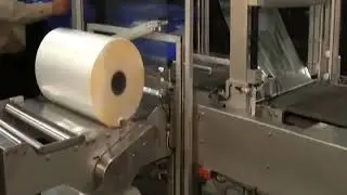 Tote Wrapper Continuous Motion- Continuous Motion Bundling Systems