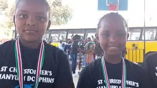 Awarding the Saint's Dolphins who went to Mombasa Swimming Gala