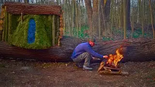Building a hidden shelter in a tree hollow. Bushcraft, survival