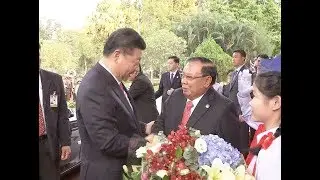 President of Laos Holds Welcome Ceremony for Visiting Chinese President Xi Jinping