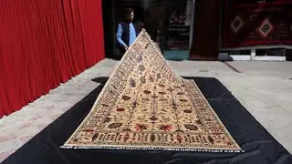 Discover Elegance with the 6.5x10 Peach Persian Rug: A Symbol of Luxury