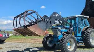 Ford 8210 MFWD loader tractor