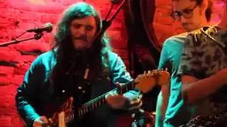Tom McCaffrey playing guitar with Civilians at Rockwood Music Hall