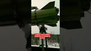 Loading a quasi-ballistic missile into an Iskander-M launcher #military