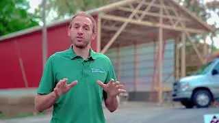 Post frame construction on a concrete foundation