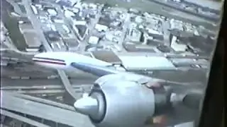 Lockheed Constellation spewing exhaust flames, Kansas City Downtown Airport