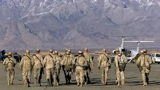 U.S., NATO forces evacuate largest military base in Afghanistan
