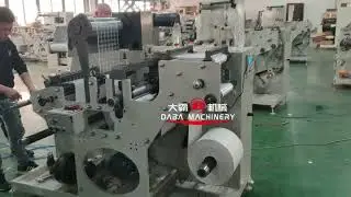 Rotary die cutting machine with turret rewinder with waste exhaust device