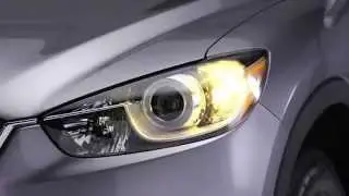 How to use the remote keyless entry system in the 2015 Mazda CX-5