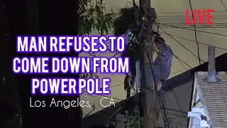 Man Climbed Power Pole and Refuses to come down. South Los Angeles.