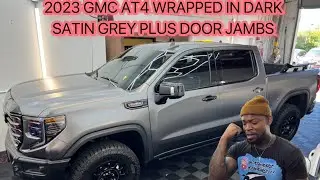 2023 GMC Sierra 2500 wrapped in Dark Satin Grey