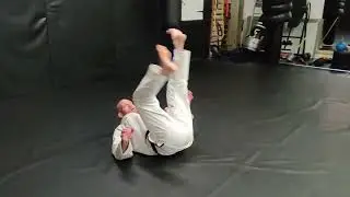 The Backwards Roll - Brazilian Jiu Jitsu fundamentals - Pete Irving - Newcastle Fight Centre