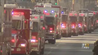 Procession For City Firefighters Lines The Streets Of Baltimore