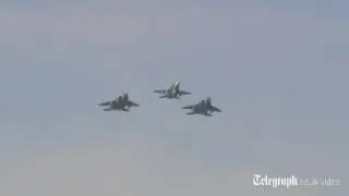 Leaders watch Red Arrows flypast over Nato summit