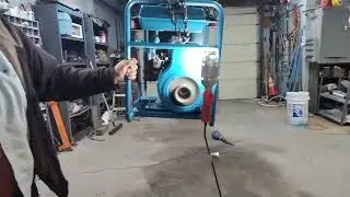 Generator running in Slow Motion hanging on chain.