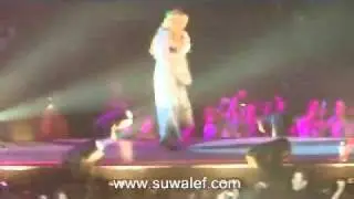 Miley Cyrus fan runs on stage and scares her 2011