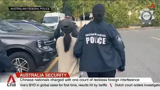Australia arrests two Chinese nationals accused of spying on Buddhist group