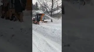 When sidewalks disappear under deep snow, the Trackless Twin Auger Snowblower gets to work!