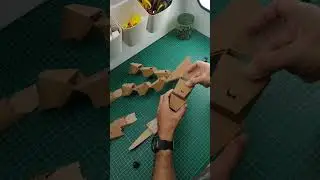 Innovative hinge for mechanical robot hand craft. Made out of cardboard.