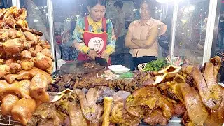 Selling grilled pork ears & more meat, In front of New World Borey Market Chhouk Va 1,