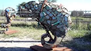 Junk Yard Art at its finest ...Chameleon is Surely a Winner