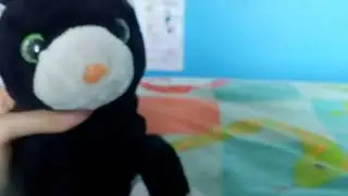 Puss babysits baby max