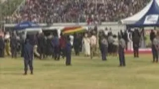 Zimbabwe - Mugabe's coffin arrives at Rufaro stadium / Rush as mourners jostle to see Mugabe remains