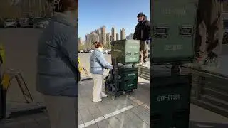 A compact forklift with adjustable-width forks. Maneuverable, portable, and handles 300kg with ease.