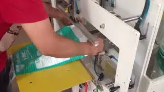 Good price semi automatic Disposable adult diaper wrapping machine
