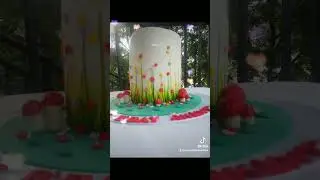 fondant cake ..hand painted leves ..fondant flowers 😍😍