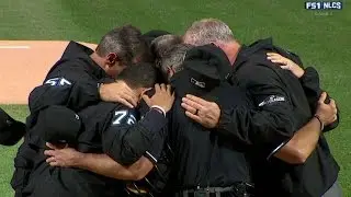 NLCS Gm1: Umpires prepare for action at Wrigley Field