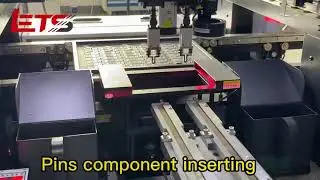 Odd-form component insertion machine with bulk feeder and two spindles.