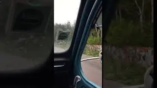 My 2CV on a rainy French country road