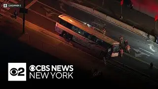 NJ Transit bus gets stuck on road divider in Jersey City