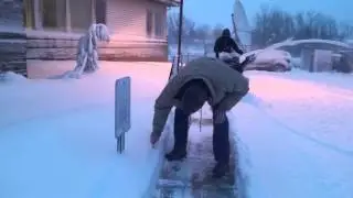 WITL- Banana & Stephanie measure the snow in Lansing, Michigan from Winter Storm Petros