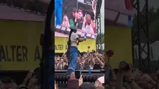 Doechii signs a fan&rsquo;s chest at Open&rsquo;er Festival in Poland. #doechii