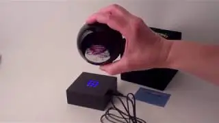 Speed of Light UV Black Light Glass Paperweight by Glass Eye Studio