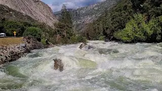 Scenic wild and raging Merced River in Yosemite National Park during spring snow melt