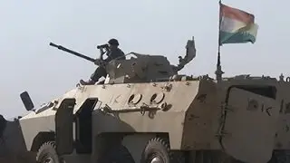 Raw: Kurish Forces, IS Militants Clash in Iraq