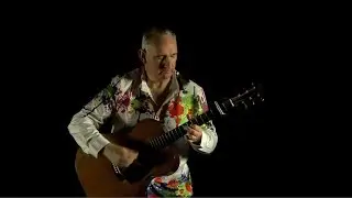 Acoustic guitarist Tony Skinner strums the heck out of a 1941 00018 vintage Martin acoustic guitar