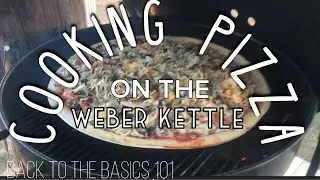 Pizza on the kettle grill over Applewood.