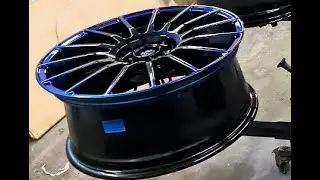 Candy finish on a custom black base with course silver - Oz Racing